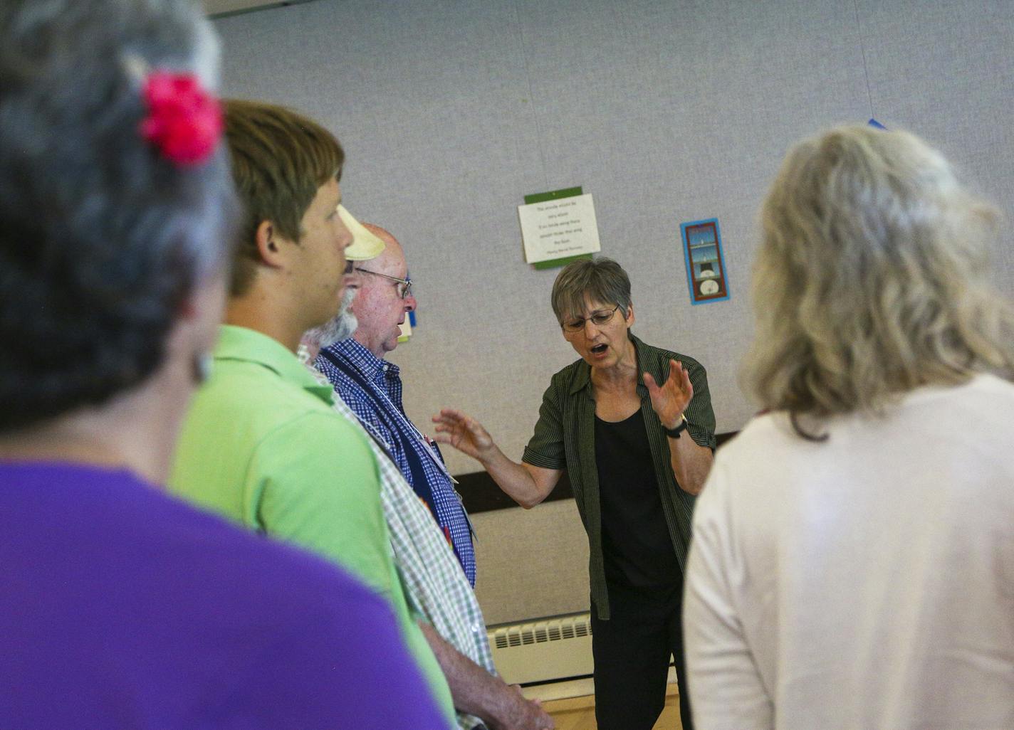 Ruth Fitz, center, leads a group in a workshop called "Soulful Singing," where experienced and novice singers learn orally learn rounds, sacred chants, and spirituals. ] Timothy Nwachukwu &#x2022; timothy.nwachukwu@startribune.com More than 1,000 members of the Religious Society of Friends or Quakers participated in the faith's annual Friends General Conference at the College of St. Benedict on Friday, July 8, 2016 in St. Joseph, Minn. Workshops covered a variety of material where participants c