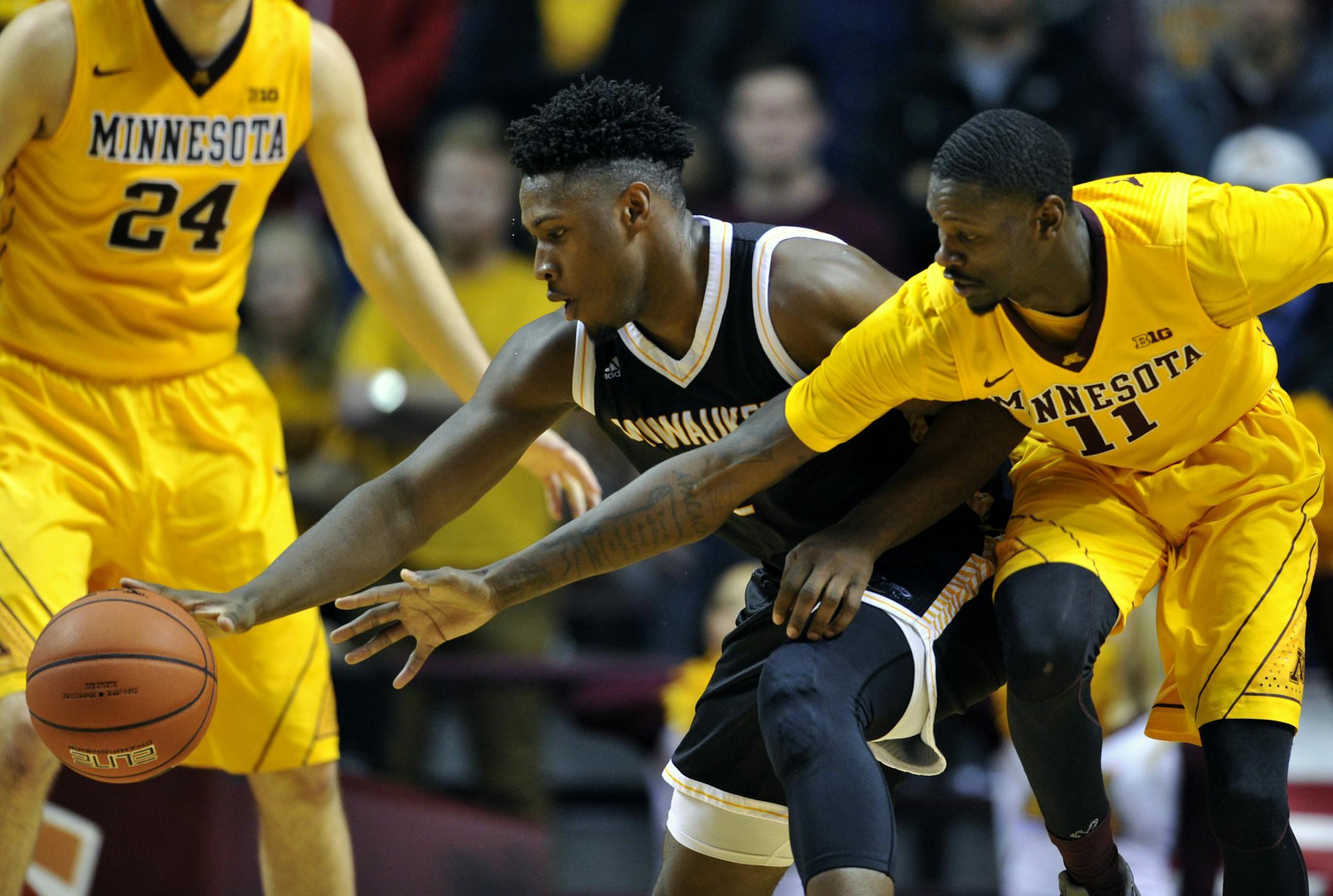 Guard Akeem Springs (center) played against the Gophers last season.
