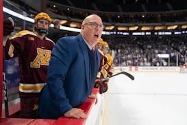 Gophers men's hockey coach Bob Motzko yelled at players late in the first period during a game earlier this season.