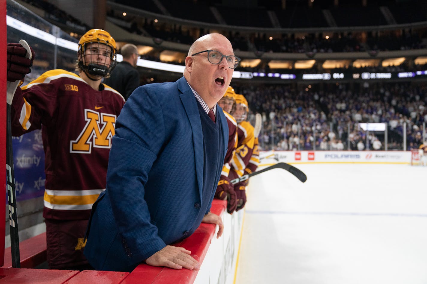 Gophers men's hockey coach Bob Motzko yelled at players late in the first period during a game earlier this season.