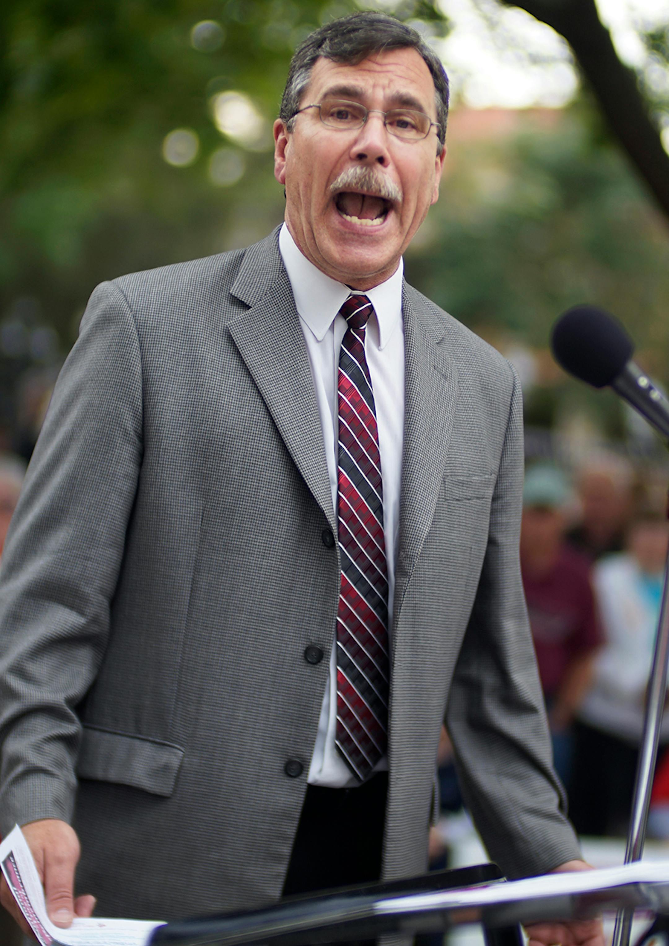 In front of the governor's mansion in St. Paul, pro-life activists gathered to ask Gov. Mark Dayton to investigate Planned Parenthood and calling for legislators to defund the organization. Brian Gibson, executive director of Pro-Life Action Ministries was leading the crowd of over 500.