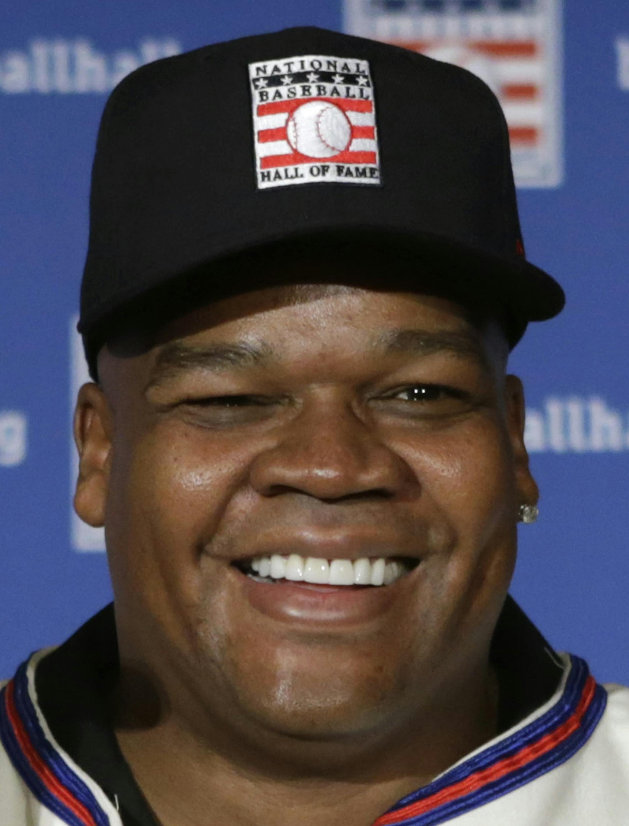 ADVANCE FOR WEEKEND EDITIONS, JULY 26-27 - FILE - In this Jan. 9, 2014 file photo, former Atlanta Braves pitchers Tom Glavine, left, and Greg Maddux, right, pose with Chicago White Sox slugger Frank Thomas after a press conference announcing their election to the 2014 Baseball Hall of Fame class in New York. Induction ceremonies are Sunday, July 27, 2014 in Cooperstown, N.Y. (AP Photo/Kathy Willens, File)