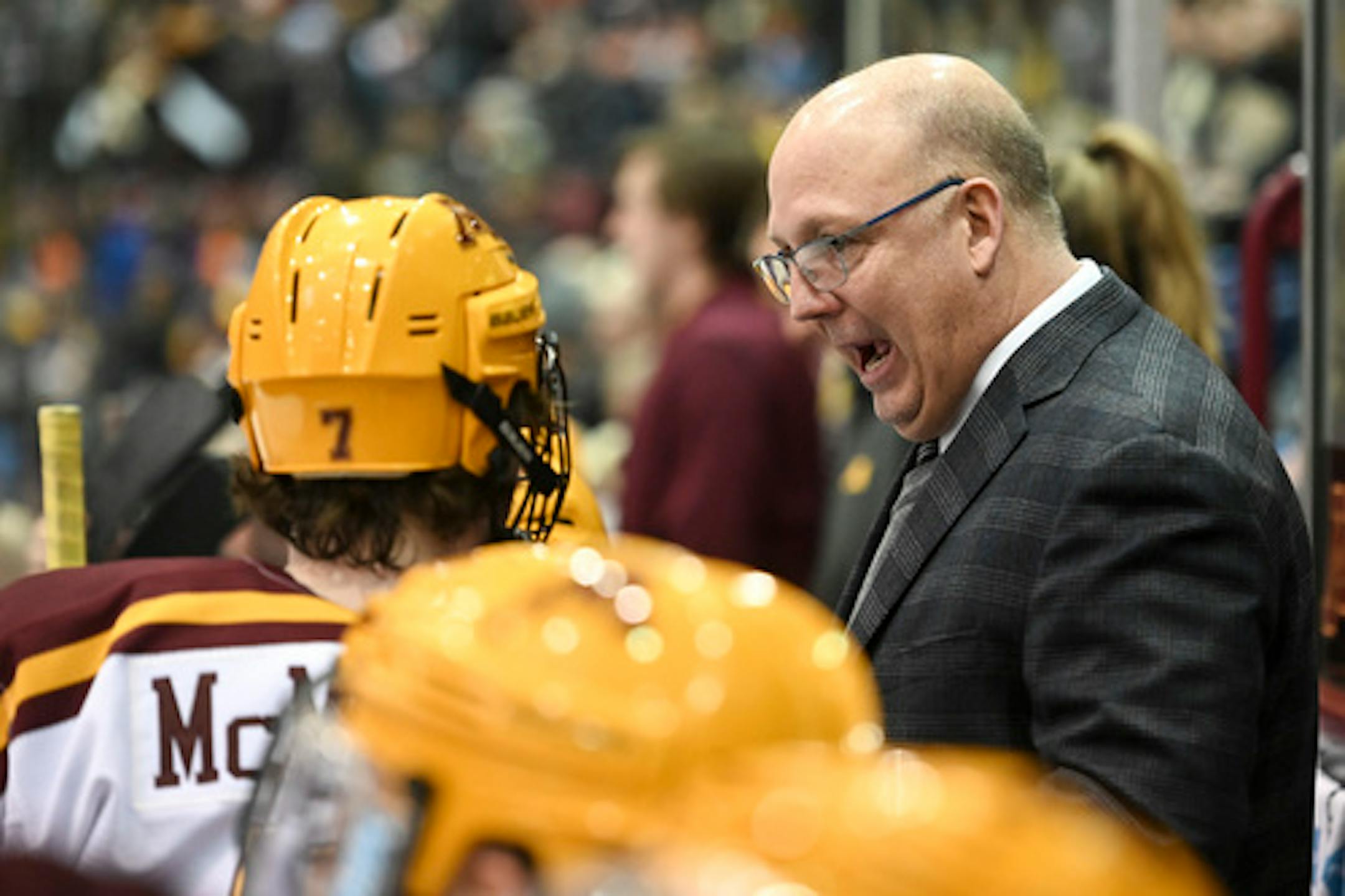 Gophers men's hockey coach Bob Motzko and forward Brannon McManus.