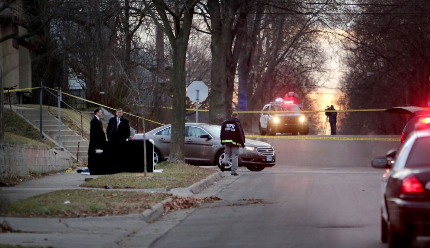 The scene of an early morning homicide at 34th and Fremont Ave. N. Tuesday, Dec. 8, 2015, in Minneapolis.