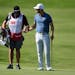 Matthew Wolff, right, talks with his caddie during the second round of the 3M Open on Friday, July 24, 2020, at TPC Twin Cities in Blaine, Minnesota. 