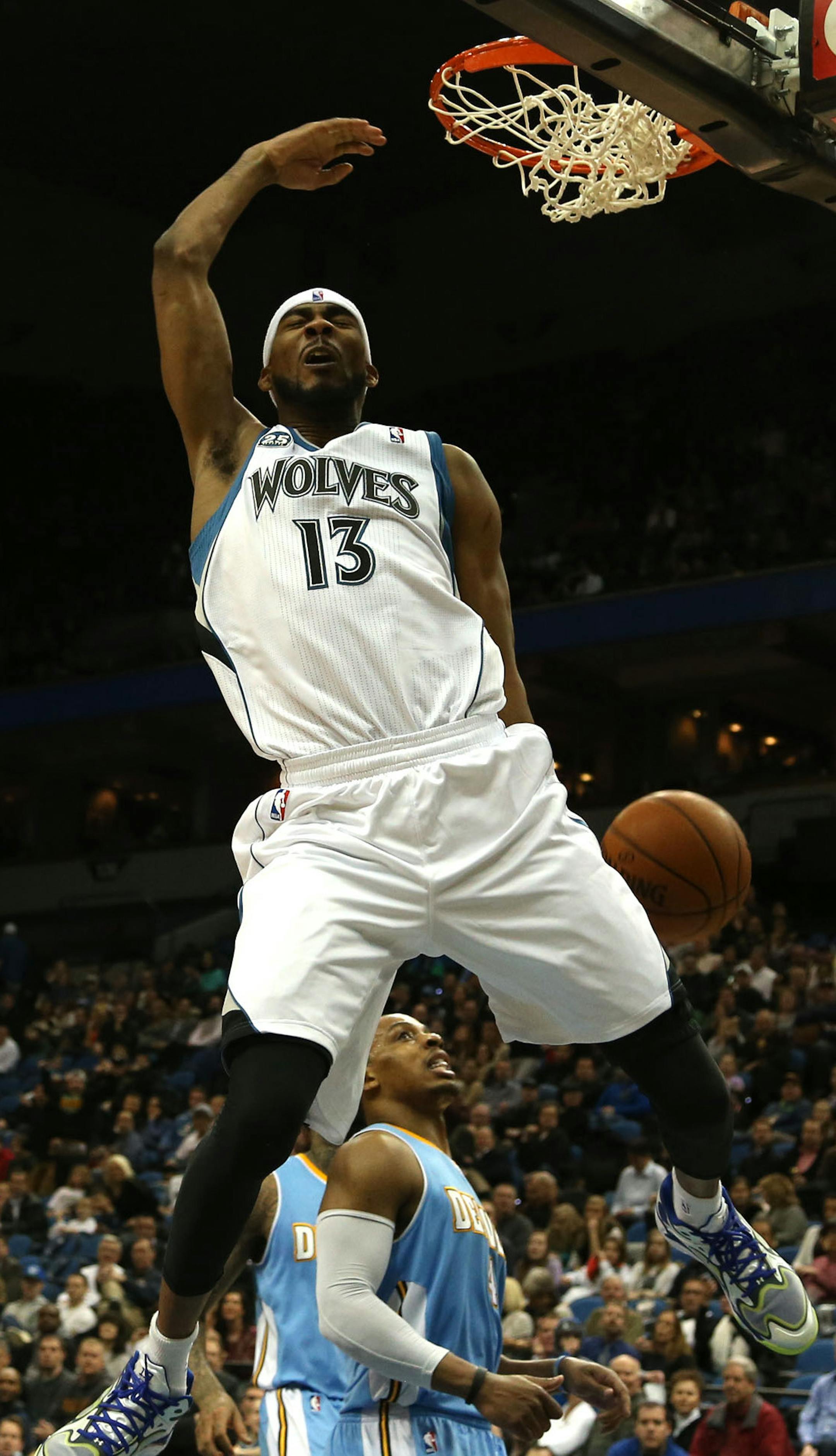 Wolves Corey Brewer dunked during the first half at the Target Center in Minneapolis Wednesday, February 12, 2014. ] (KYNDELL HARKNESS/STAR TRIBUNE) kyndell.harkness@startribune.com