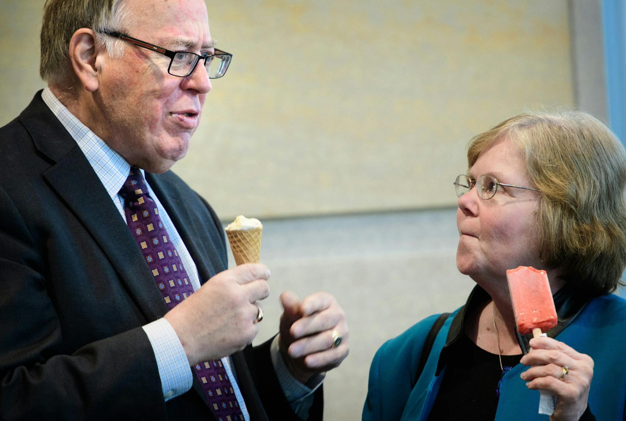 Senator David Senjem and Rep. Diane Loeffler talked over Schwan's ice cream at the social sponsored by the Coalition of Greater Minnesota Cities. Senjem and Loeffler are co-chairs of the Capitol art subcommittee and were happy to have a few minutes to talk about it. ] GLEN STUBBE * gstubbe@startribune.com Wednesday, May 11, 2016 Greater Minnesota city leaders came to the Capitol Wednesday to call for the legislature to act on taxes, transpo and bonding, as the Senate considered a tax bill with p