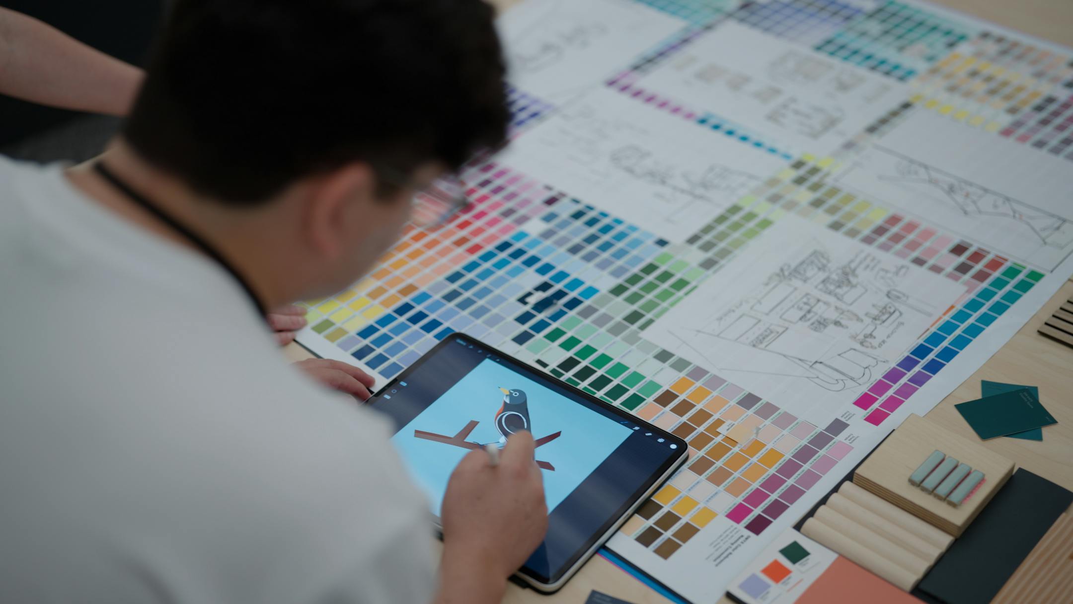 Elias Ramos-Solis, experience designer, developing the look for a new exhibit