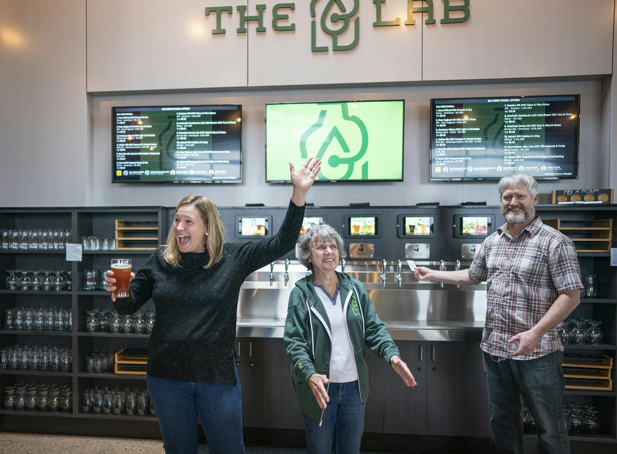 Janet Johanson, CEO of BevSource and creator of the Lab, from left, Gerri Kustelski, brewery chemist, and Matt Hall, director of innovation and pilot services, lead a tour of the Lab on Tuesday, April 30.