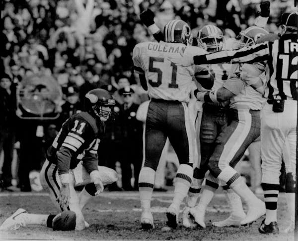 Charles Mann celebrates with Monte Coleman after sacking Vikings quarterback Wade Wilson in the second quarter of the 1988 NFC Championship Game.