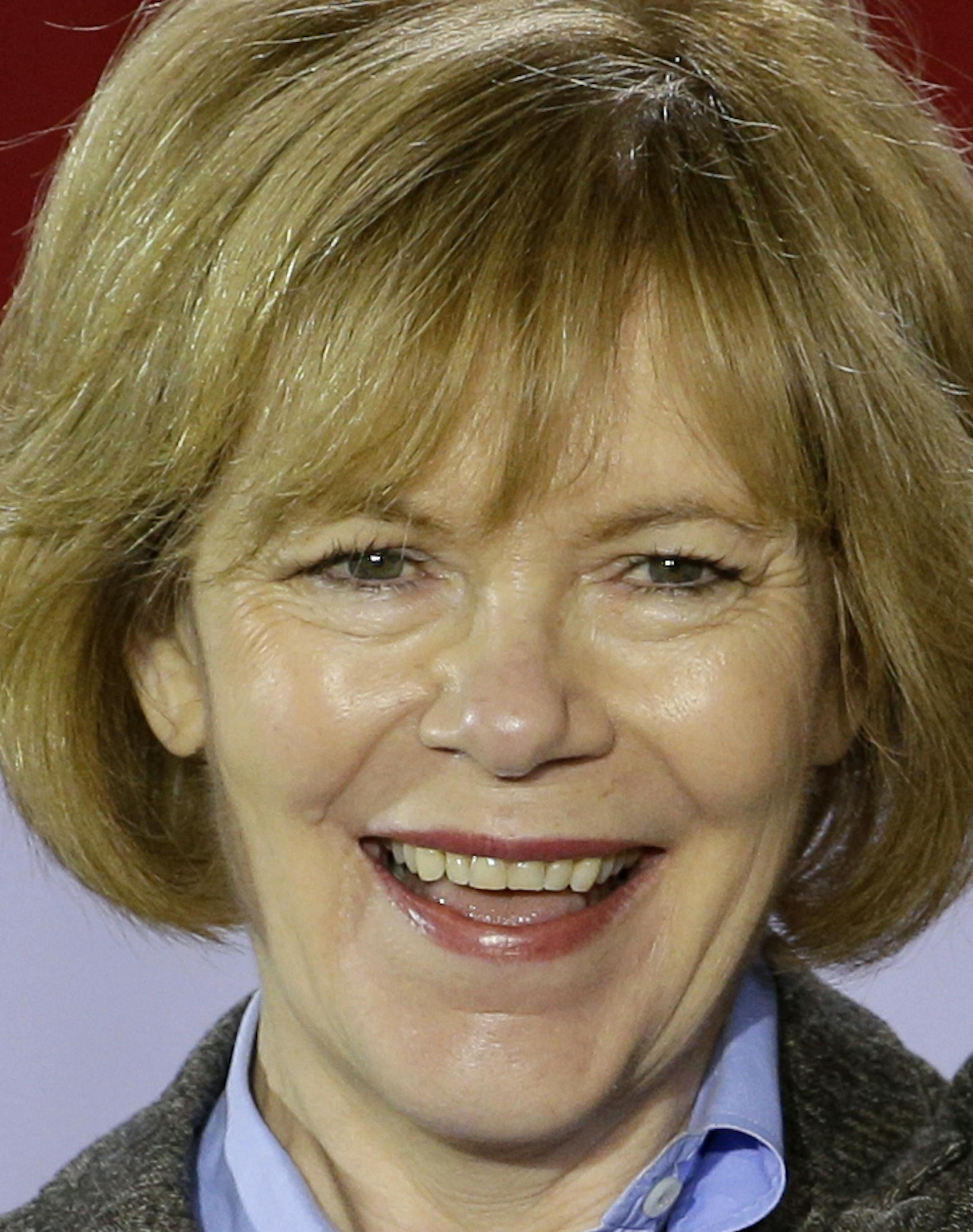 Minnesota Democratic candidate for Lt. Gov. Tina Smith appears at a get-out-the-vote rally in support for Democratic U.S. Sen. Al Franken and Minnesota Democratic Gov. Mark Dayton at Patrick Henry High School in Minneapolis, Tuesday, Oct. 21, 2014. (AP Photo/Ann Heisenfelt) ORG XMIT: OTKAH118