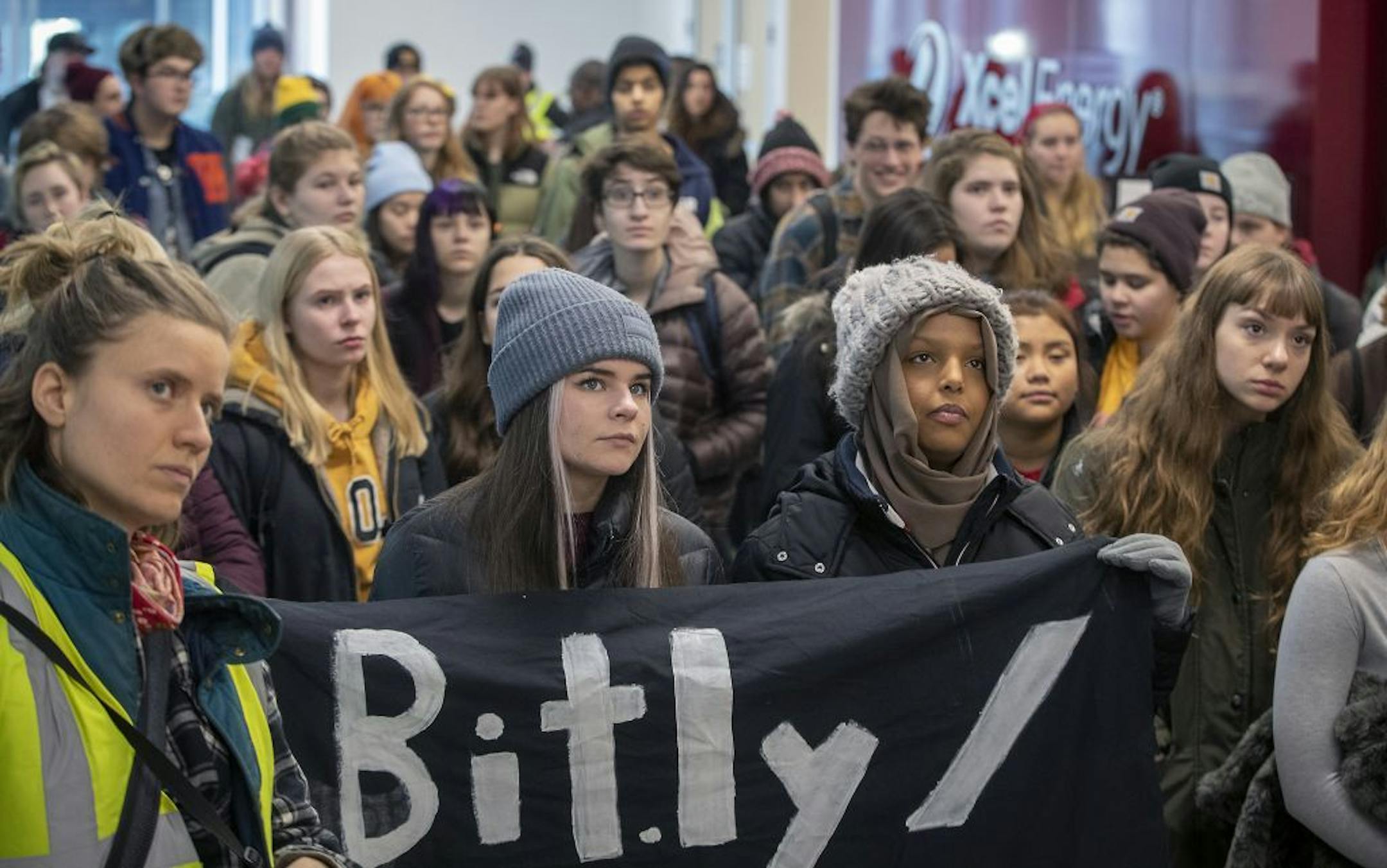 Young Minnesota activists made their way through the skyway on their way to the Xcel offices to demand that they stop buying energy from the HERC incinerator and promote a just transition to clean energy through a number of other policies, Friday, December 6, 2019 in downtown Minneapolis, MN. ELIZABETH FLORES • liz.flores@startribune.com