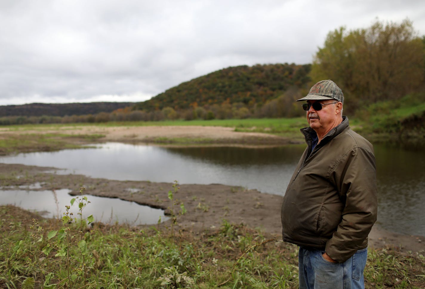 Landowner Albert Carlson, stands on land that would normally be a large cornfield.