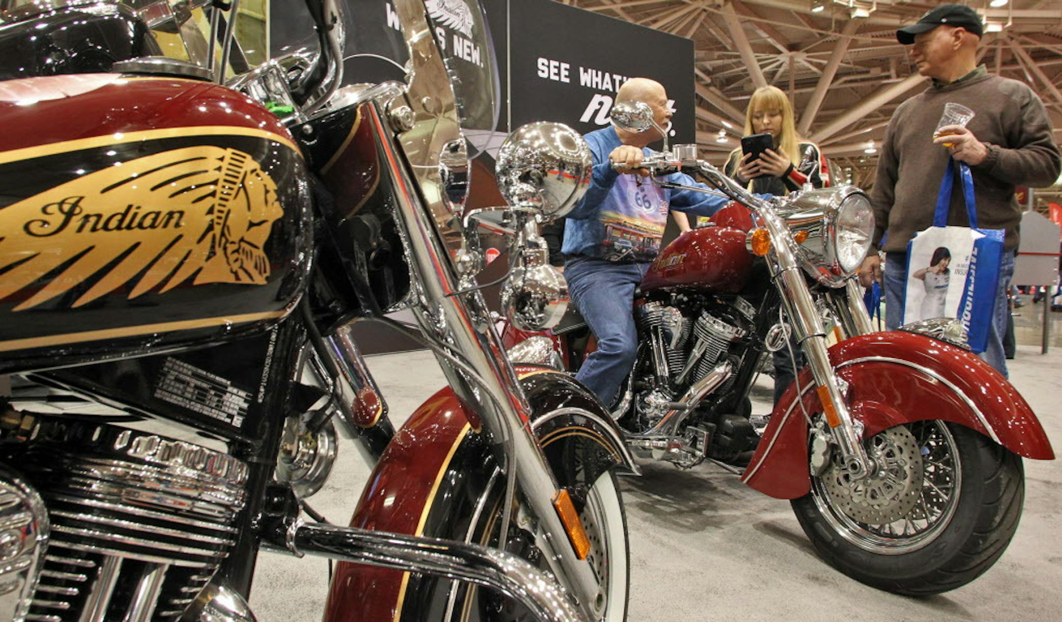 Polaris and Indian Motorcycles are combining forces in launching a new motorcycle for 2014. The Motorcycle Show at the Minneapolis Convention Center featured a display of cycles. Show patrons sat on the Indian 2013 models. (MARLIN LEVISON/STARTRIBUNE(mlevison@startribune.com (cq - )
