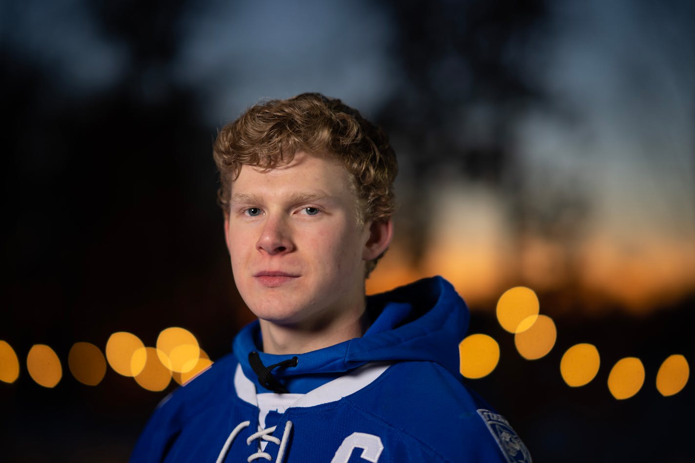 Defenseman Chase Cheslock of Rogers High School, a selection for the Star Tribune's All Metro First Team, photographed Sunday evening, February 5, 2023 on the backyard rink of Tom Schoolmeesters in Circle Pines, Minn. ] JEFF WHEELER • jeff.wheeler@startribune.com