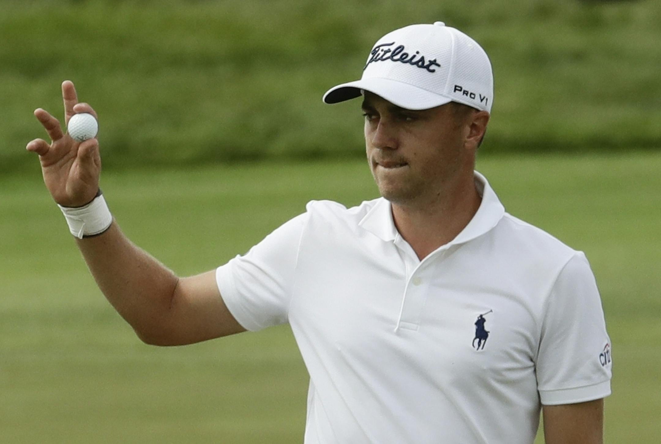 Justin Thomas reacts after his birdie on the 17th hole during the third round of the U.S. Open golf tournament Saturday, June 17, 2017, at Erin Hills in Erin, Wis. (AP Photo/A Charlie Riedel)
