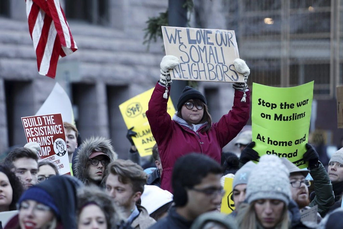 Protesters gather for a rally against President Donald Trump's temporary immigration ban on seven predominantly Muslim countries at the Warren E. Burger Federal Building & United States Courthouse Tuesday. Jan. 31, 2017, in Minneapolis.