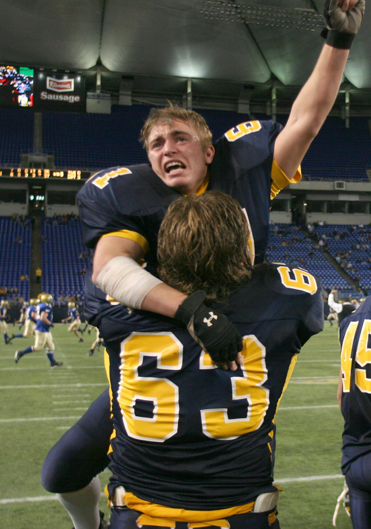 BRUCE BISPING ï bbisping@startribune.com Bruce Bisping/Star Tribune. Minneapolis, MN, Friday, 11/26/2005 (top to bottom) Mahtomedi's Nate Chapin and Matt Symanietz celebrated the Zephyrs 4A championship win over Holy Angels.