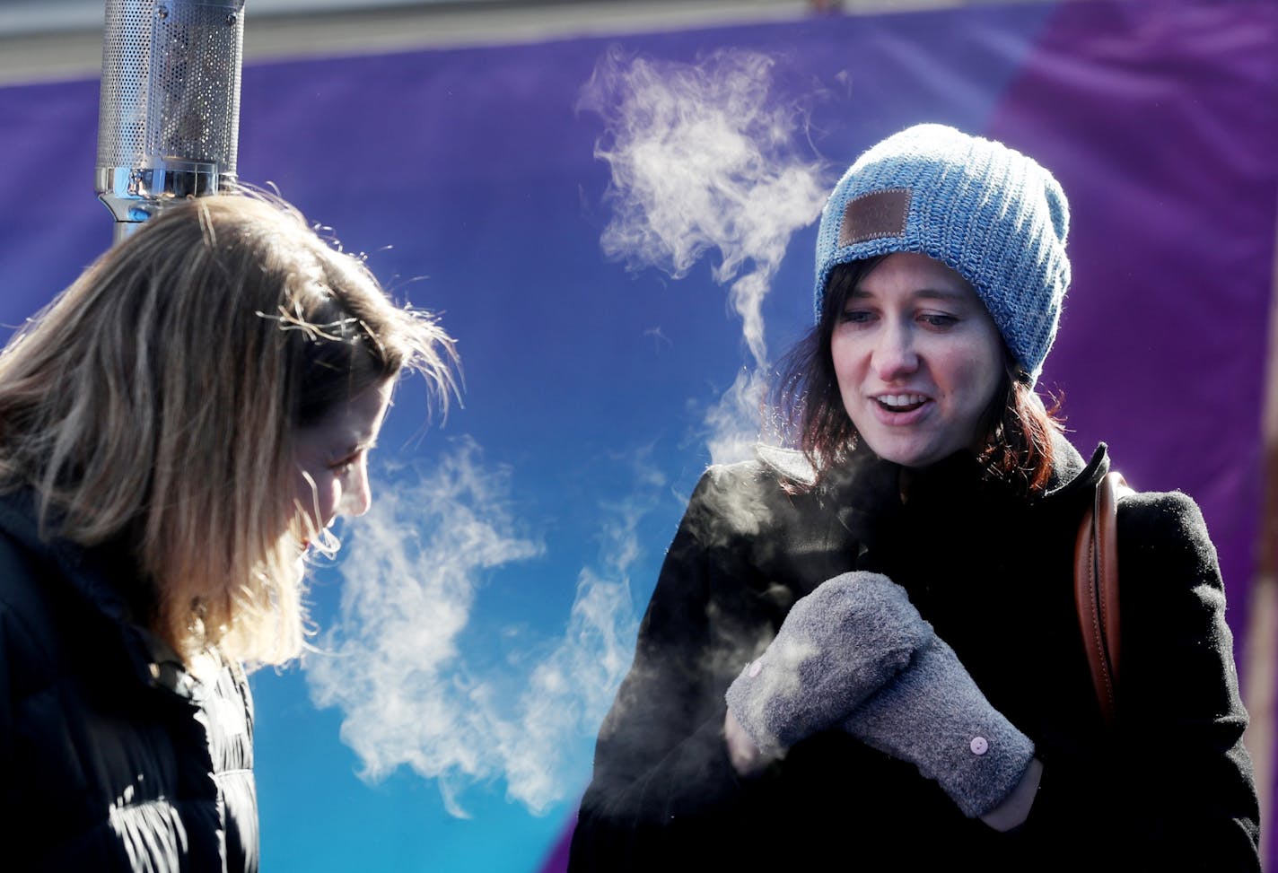 Minnesotans Kelly Johnson, left, of Lino Lakes and Claire MacDonald of Minneapolis were unfazed by cold air as they wait to get inside the U.S. Bank Stadium last February.