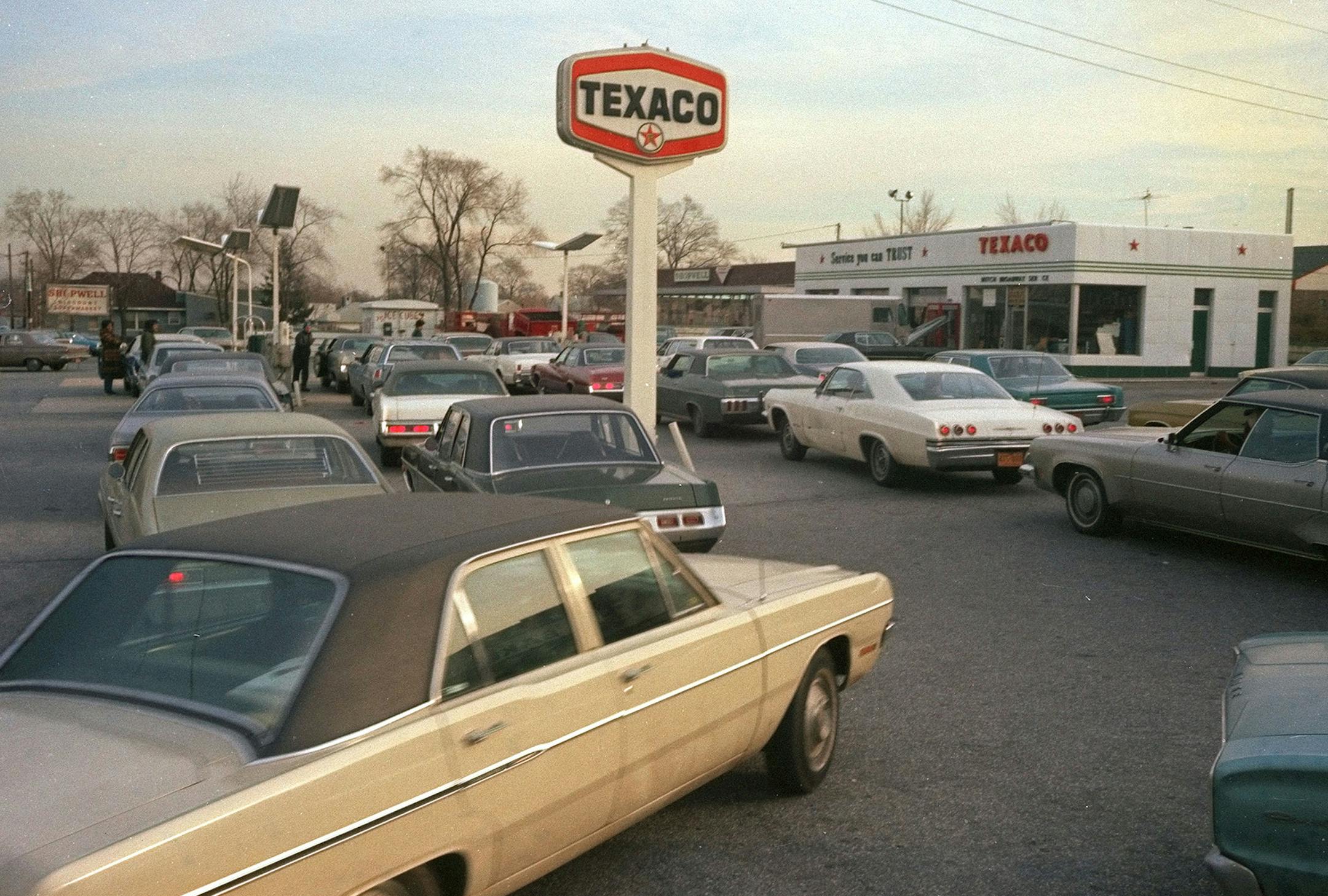 Motorists line up at a gas station on New York's Long Island, hoping to fill their tanks during the gasoline shortage of 1973-1974. Long lines and fuel restrictions were common across the country. (AP Photo) ORG XMIT: APHS181