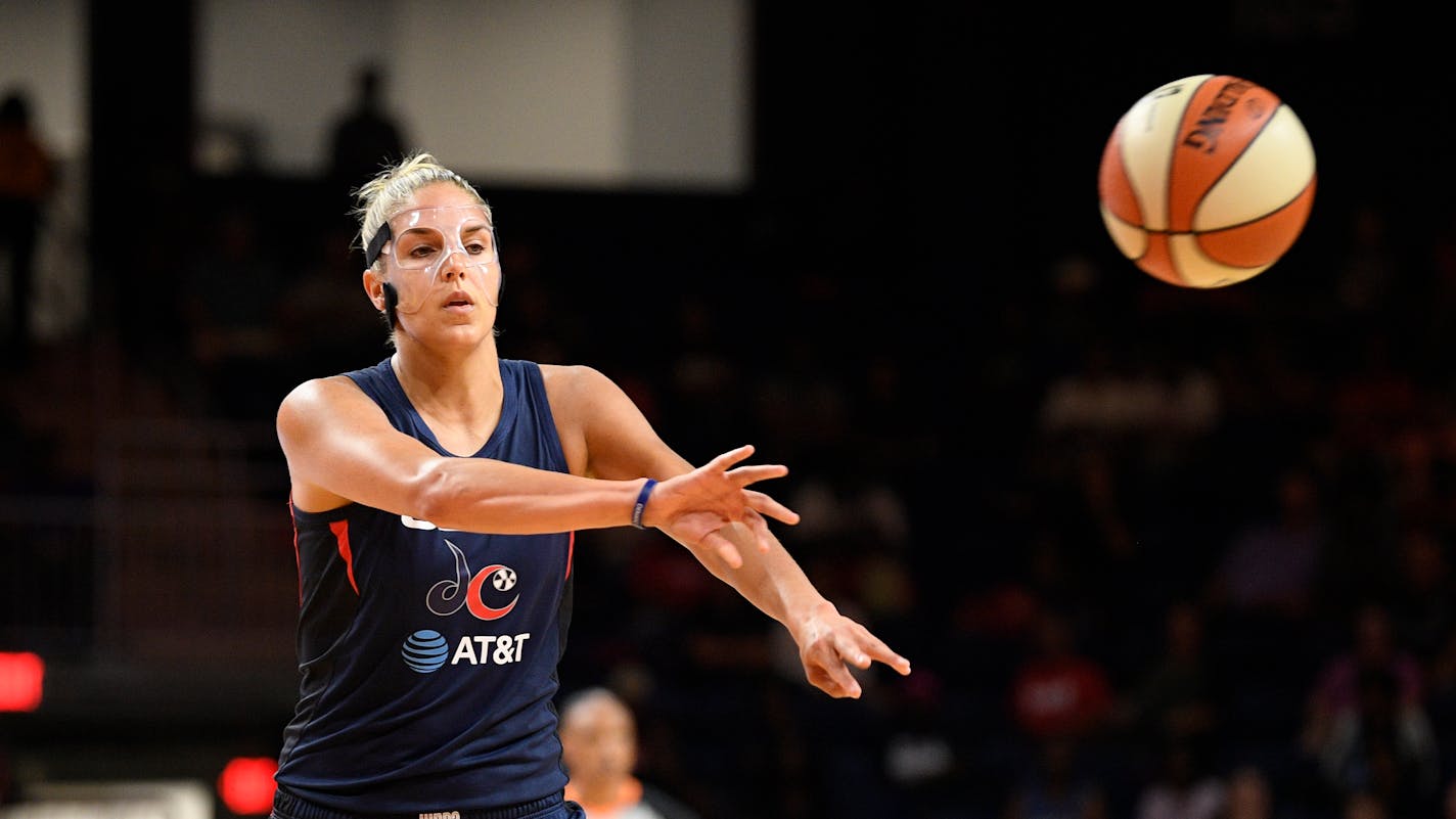 Washington Mystics forward Elena Delle Donne (11) passes the ball during the first half of an WNBA basketball game against the Seattle Storm, Wednesday, Aug. 14, 2019, in Washington. (AP Photo/Nick Wass)