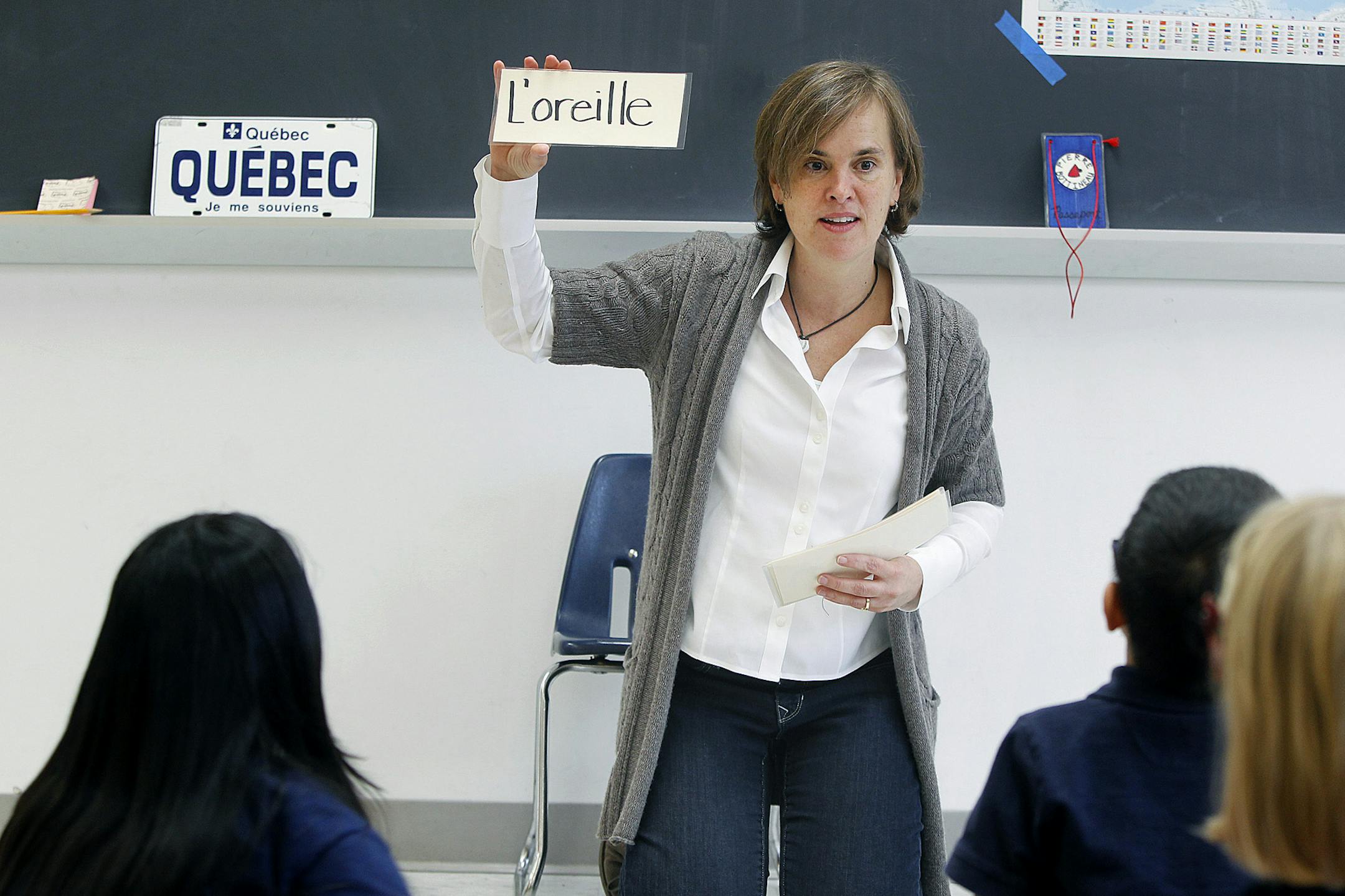 French teacher Julie Young Walser taught her first graders vocabulary through dance at the new French immersion school named after Pierre Bottineau, Monday, November 5, 2012 in Minneapolis, MN. The French immersion school is the state's first self-governed school. (ELIZABETH FLORES/STAR TRIBUNE) ELIZABETH FLORES • eflores@startribune.com
