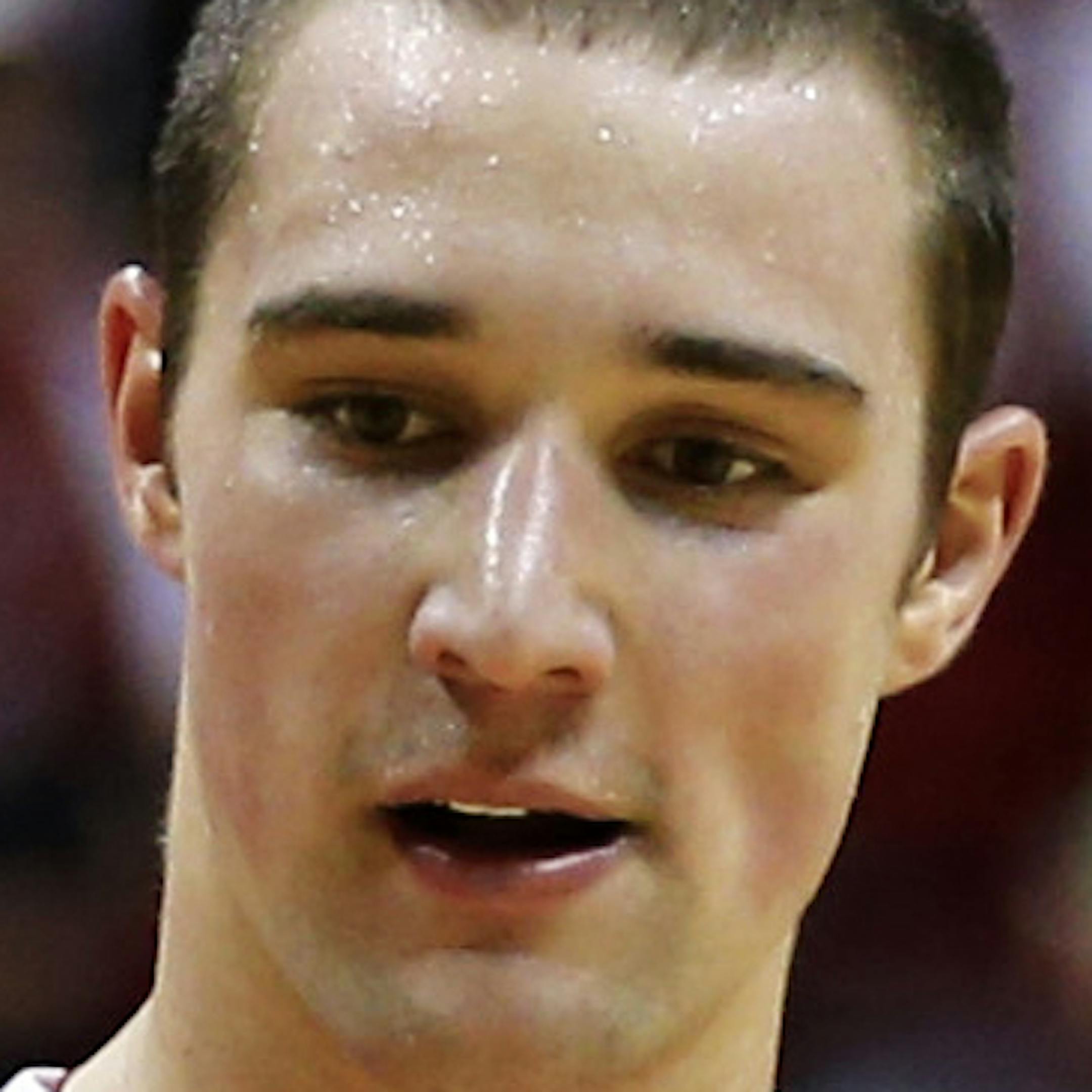 Ohio State's Aaron Craft (4) and Sam Thompson celebrate late in the second half of an NCAA college basketball game against Indiana, Tuesday, March 5, 2013, in Bloomington, Ind. Ohio State won 67-58. (AP Photo/Darron Cummings) ORG XMIT: MIN2013030522560296