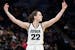 Iowa guard Caitlin Clark calls to the crowd for support after making two intentional foul free throws against Ohio State in the second half of an NCAA