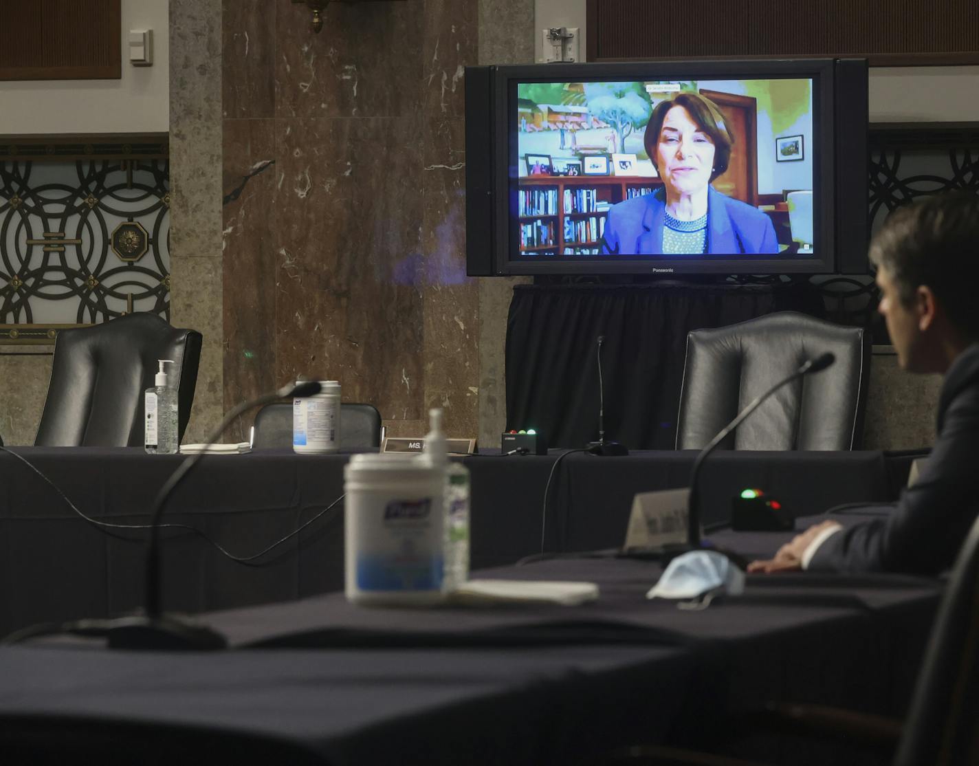 Sen. Amy Klobuchar, D-Minn., questions Justin Walker via teleconference during a Senate Judiciary Committee hearing on Walker's nomination to be a U.S. circuit judge for the District of Columbia Circuit on Capitol Hill in Washington, Wednesday, May 6, 2020. (Jonathan Ernst/Pool Photo via AP)