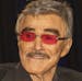 Burt Reynolds appears at the Wizard World Chicago Comic-Con on Saturday, Aug. 22, 2015, in Chicago. (Photo by Barry Brecheisen/Invision/AP) ORG XMIT: 