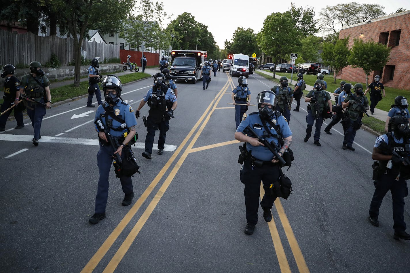 Police officers cleared a section of Hamline Avenue in riot gear May 28 in St. Paul.