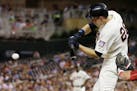 Minnesota Twins' Max Kepler hits an RBI single off Philadelphia Phillies pitcher Adam Morgan during the fifth inning of a baseball game Wednesday, Jun