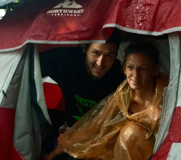 Jared Goyette, Special to the Star Tribune.
Junior and Daniela live in a tent in the Lyndale neighborhood, not far from the I-35 ramp.