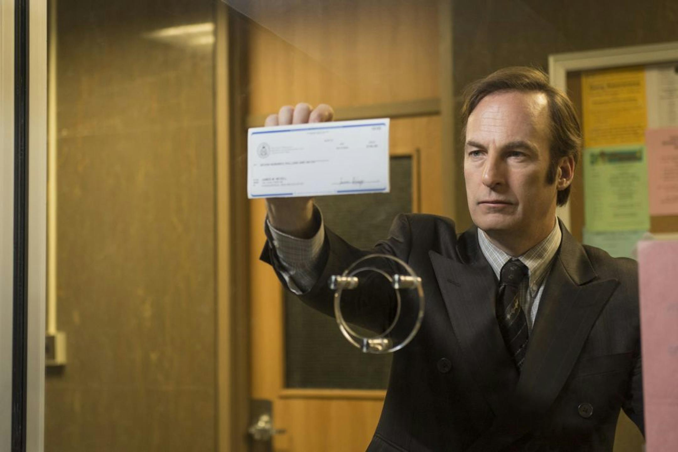 In this image released by AMC, Bob Odenkirk portrays Saul Goodman in a scene from "Better Call Saul." Odenkirk reprises his role from "Breaking Bad," in "Better Call Saul," a much-anticipated, well-worth-waiting-for prequel airing two episodes Sunday and Monday at 10 p.m. EST.