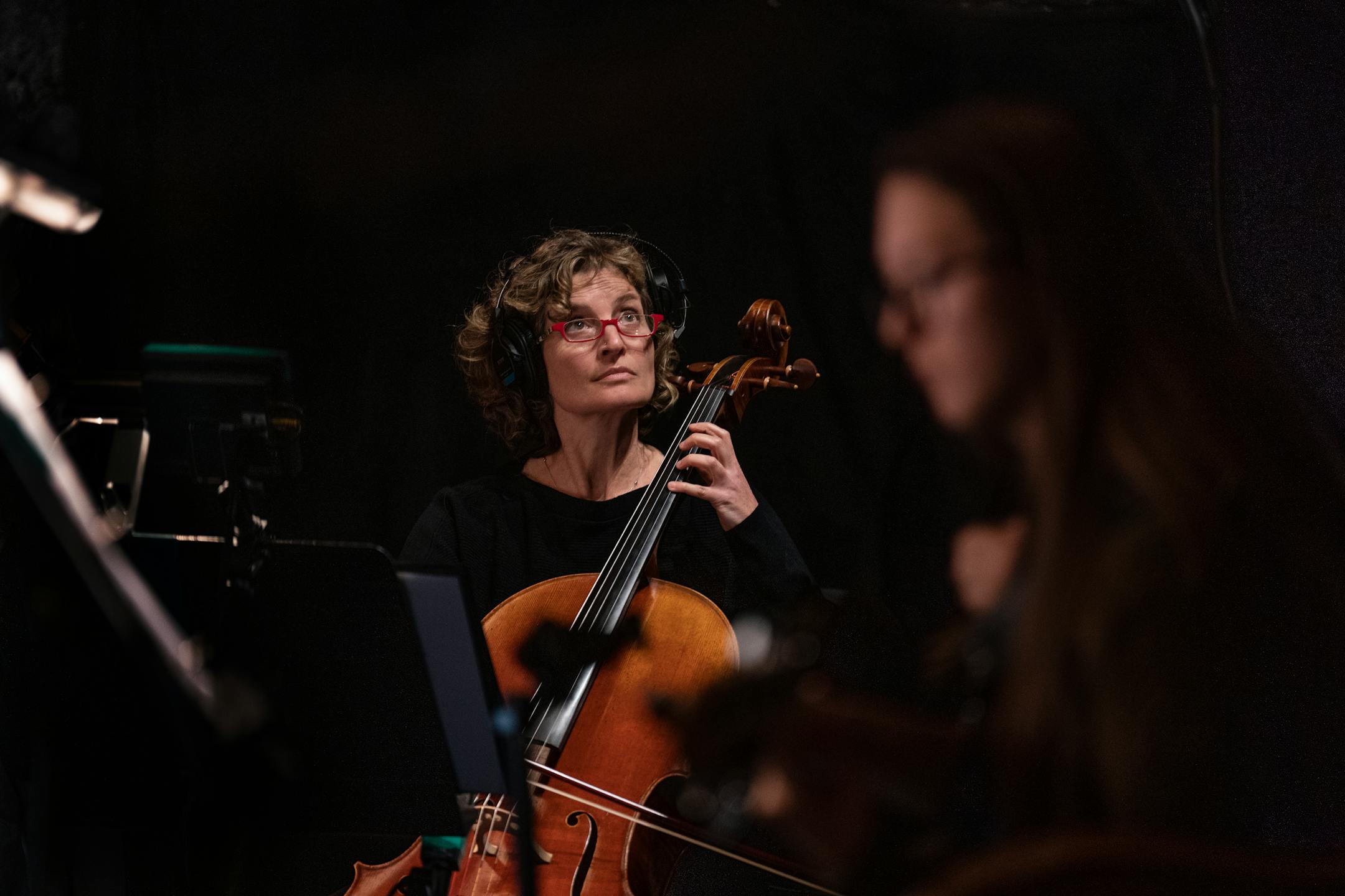 Local musician Rebecca Arons played cello during rehearsal with local band members at the Orpheum Theatre on Nov. 14, 2023 in Minneapolis.