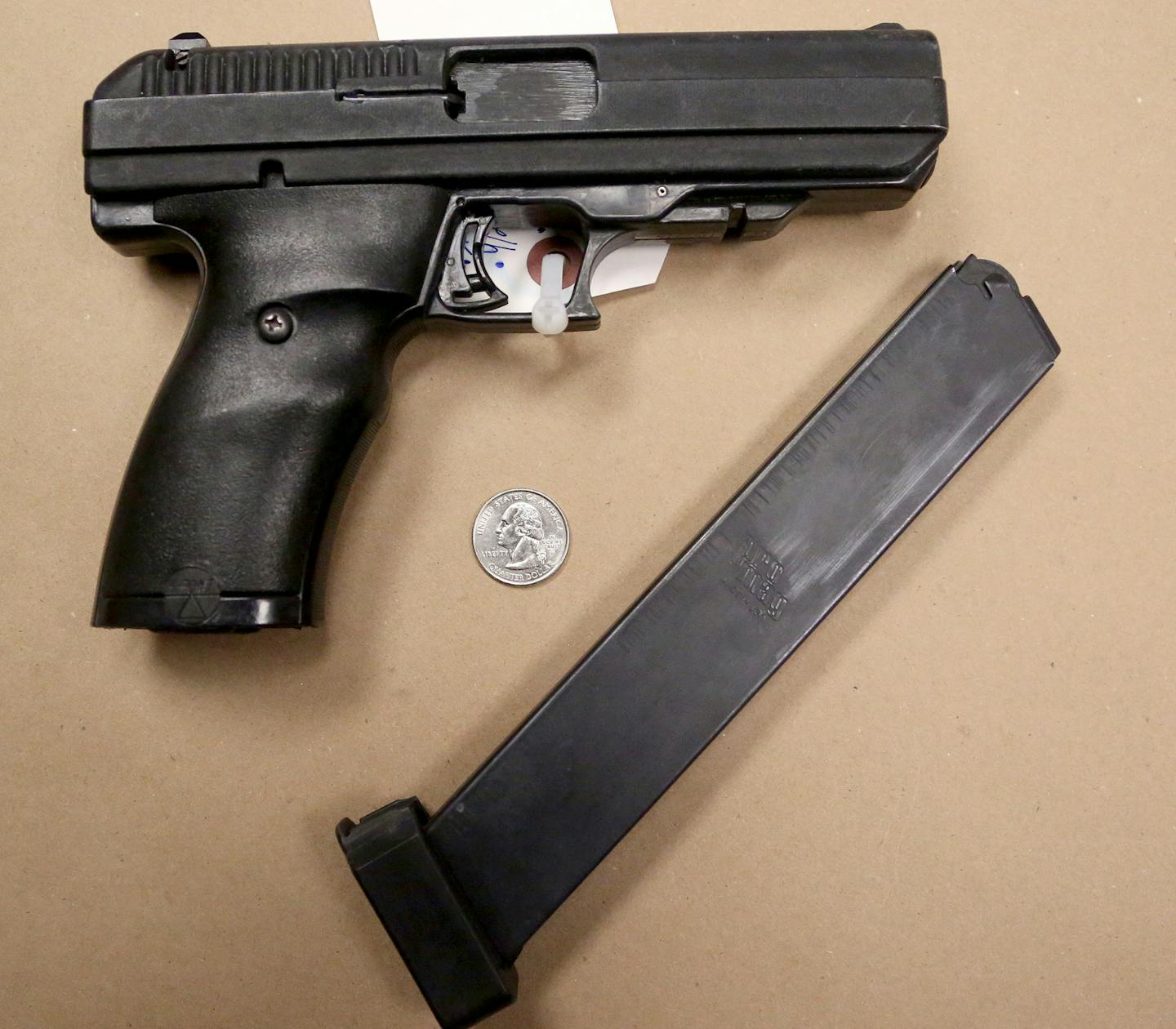 This Hi-Point model JCP .40 caliber pistol with an extended magazine is an example of the type of firearm Minneapolis Police are increasingly discovering on the streets. The extended magazine allows the gun to fire as much as twice the bullets that a standard magazine holds and was photographed Friday, Oct. 27, 2016, at the Minneapolis Police Department property and evidence room in Minneapolis, MN.] DAVID JOLES &#xef; david.joles@startribune.com Minneapolis police say they're seeing more powerf