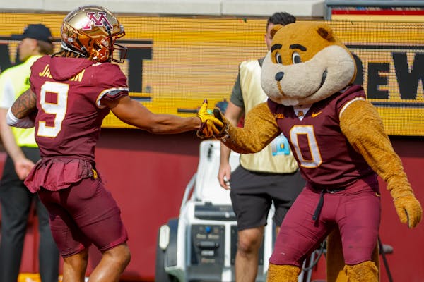 Minnesota wide receiver Daniel Jackson (9) celebrates his touchdown against Louisiana-Lafayette with Goldy Gopher last weekend.