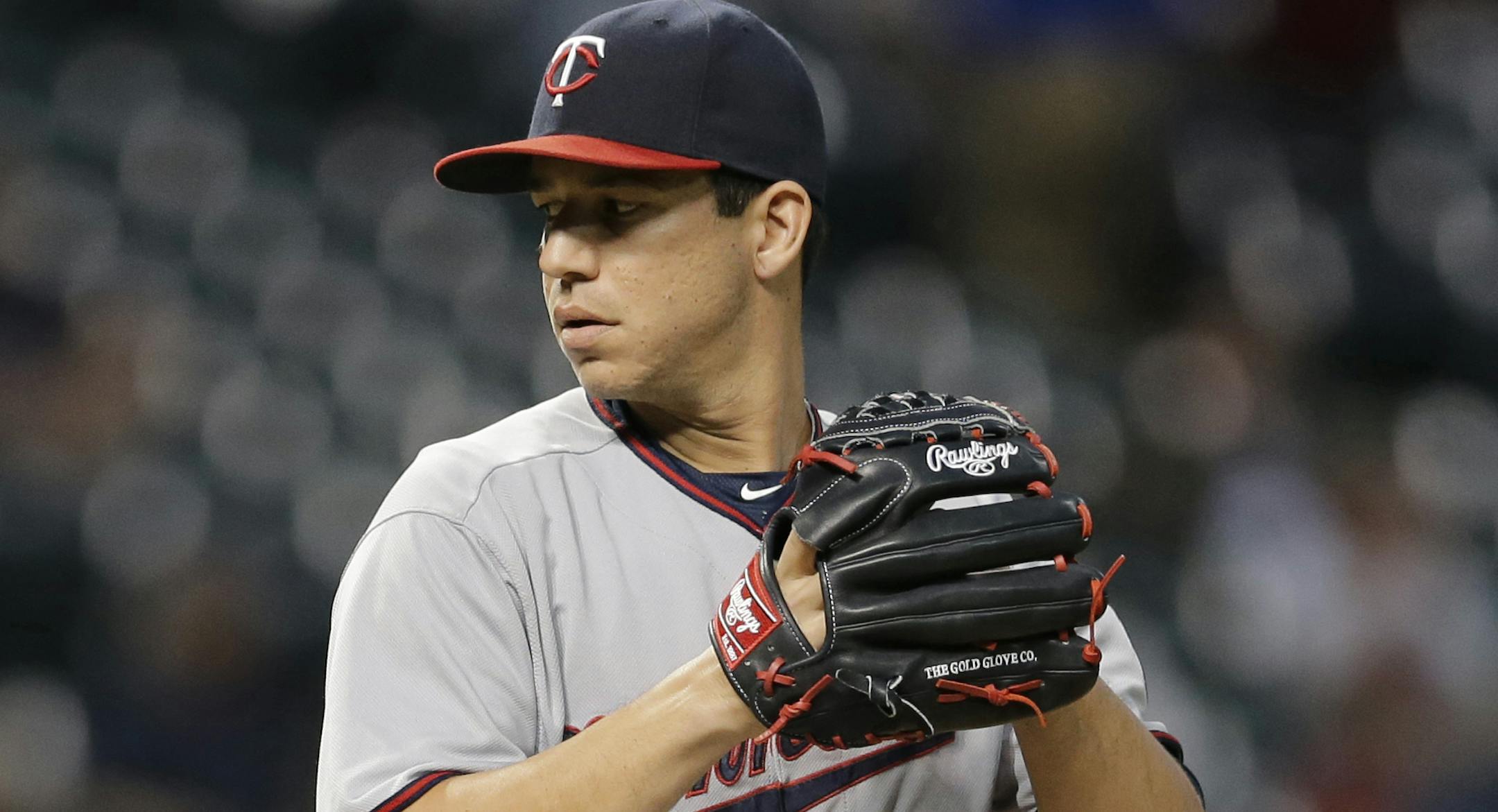 Minnesota Twins starting pitcher Tommy Milone delivers in the first inning of a baseball game against the Cleveland Indians, Monday, Sept. 28, 2015, in Cleveland. (AP Photo/Tony Dejak)