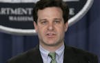In this Jan. 12, 2005 file photo, Assistant Attorney General, Christopher Wray speaks at a press conference at the Justice Dept. in Washington. Presid