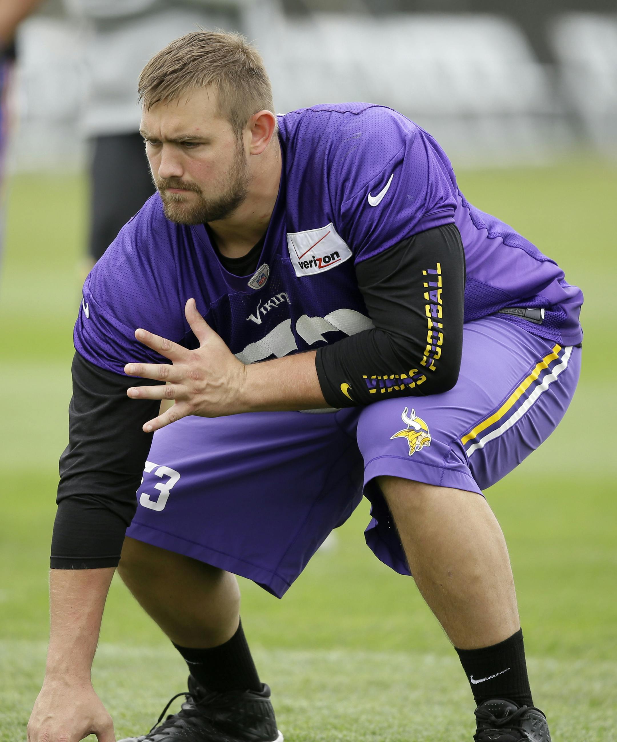 Minnesota Vikings guard Brandon Fusco gets set on the line during NFL football training camp, Monday, July 28, 2014, in Mankato, Minn. (AP Photo/Charlie Neibergall)