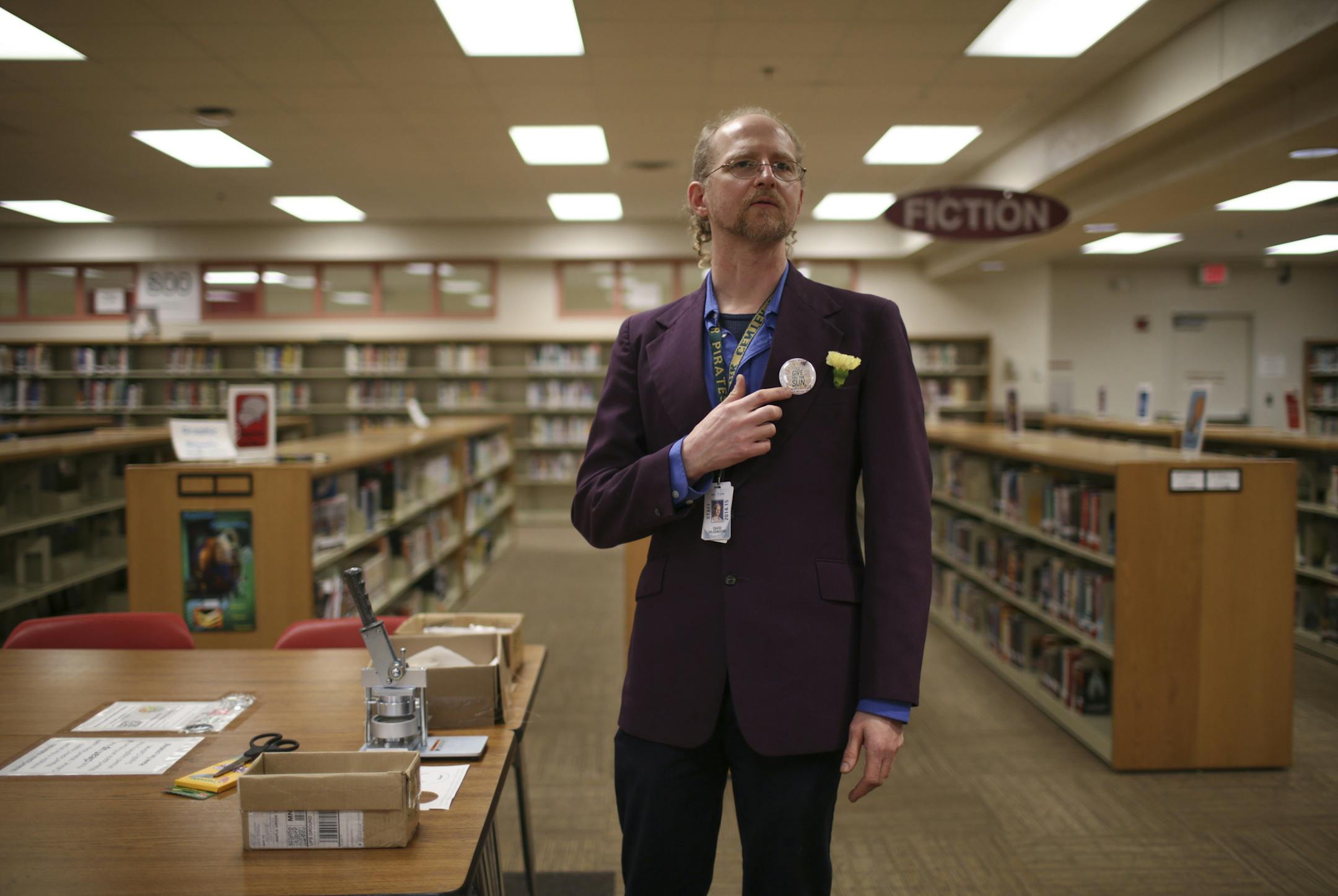 Media Specialist Dhaivyd Hilgendorf stood near the MakerSpace Station in the the Learning Commons Thursday afternoon at Park Center High School. He made the button he is pointing to with the button maker on the table to commemorate the book "I'll Give you the Sun," which won an award from the American Library Association last week. ] JEFF WHEELER &#x2022; jeff.wheeler@startribune.com The Park Center High School Library has been reimagined. Once a space that emphasized quiet learning, there is no