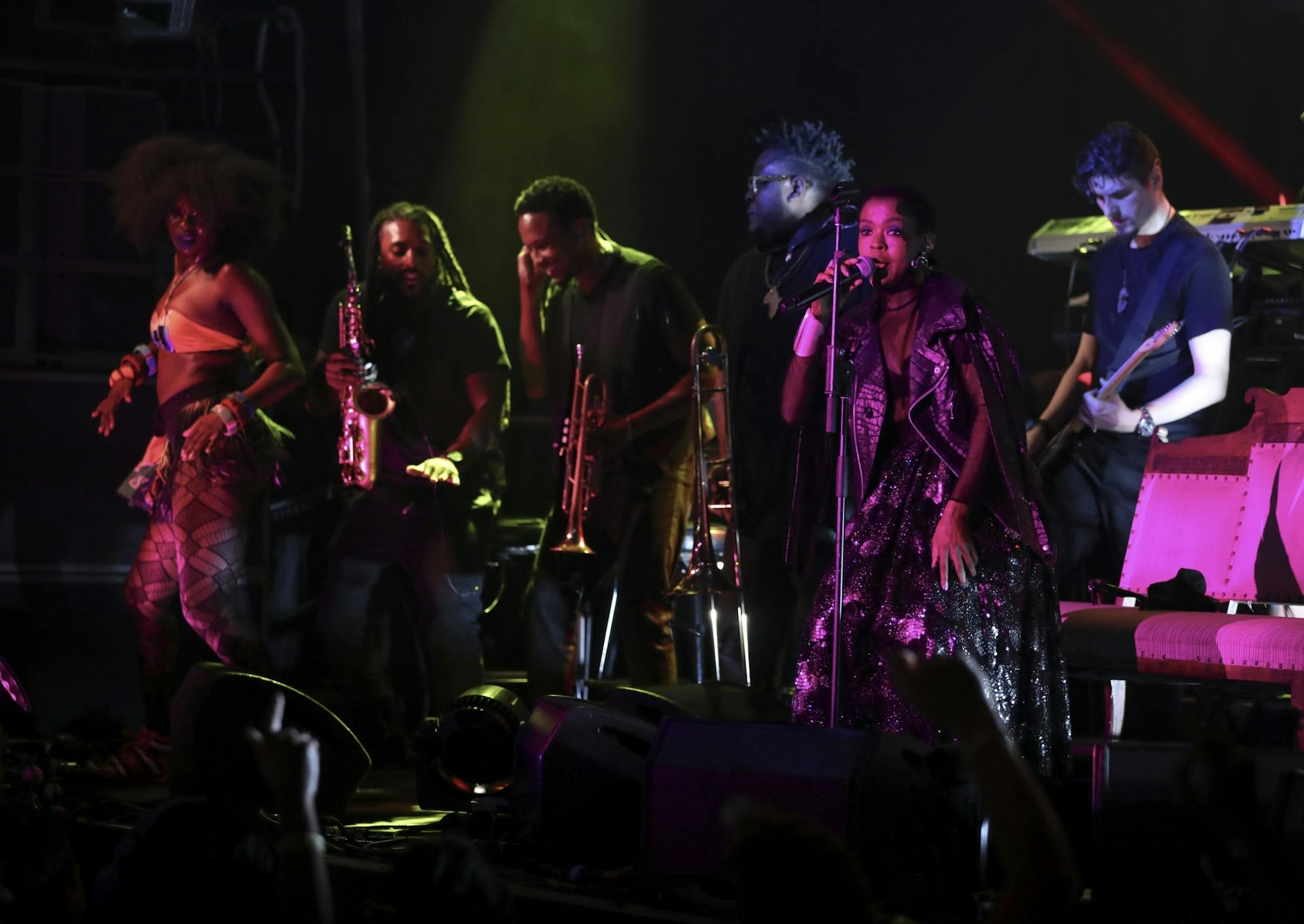 Lauryn Hill on the First Ave. stage with her band early in her set Sunday night.
