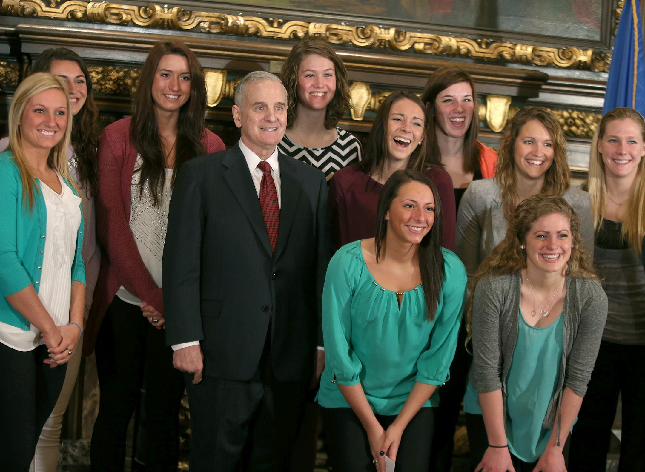 Governor Mark Dayton encouraged laughter from the Concordia Women's Volleyball team, Thursday, April 24, 2014 at the State Capitol in St. Paul, MN. The Governor hosted a reception in the Governor's Reception Room at the Minnesota State Capitol in honor of the team, who won their seventh consecutive NCAA Division II Championship last December. They are the first volleyball team to win seven consecutive NCAA championships across any division. ] (ELIZABETH FLORES/STAR TRIBUNE) ELIZABETH FLORES 