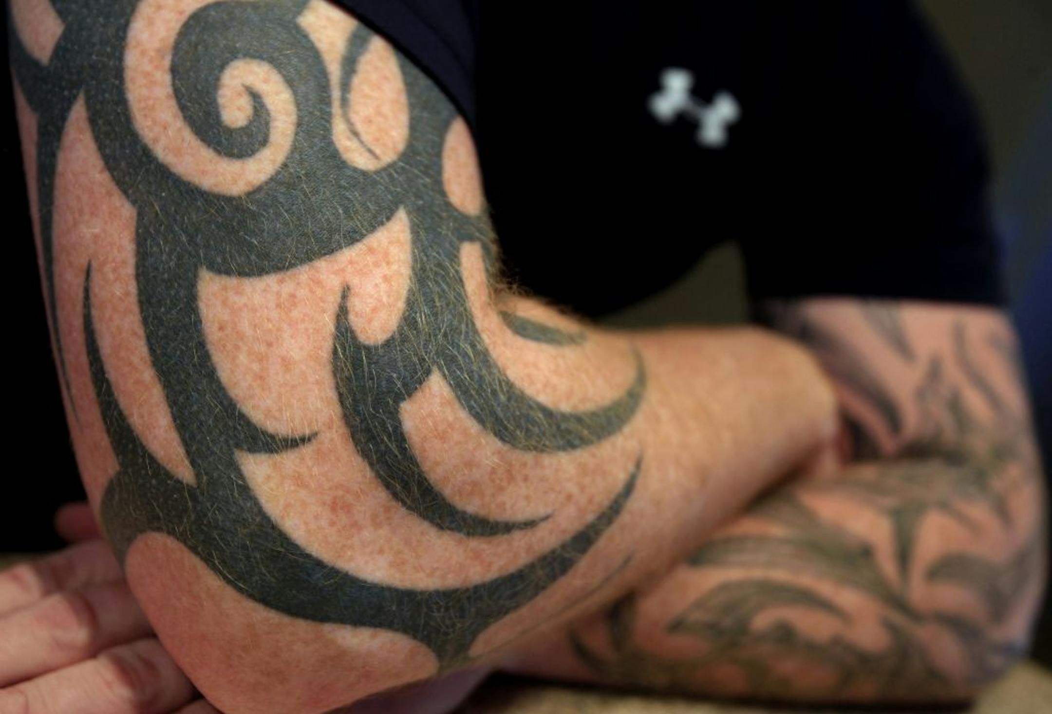 Hennepin County's policy on visible tattoos is stricter than those at some law enforcement organizations, but it's the sheriff's call.