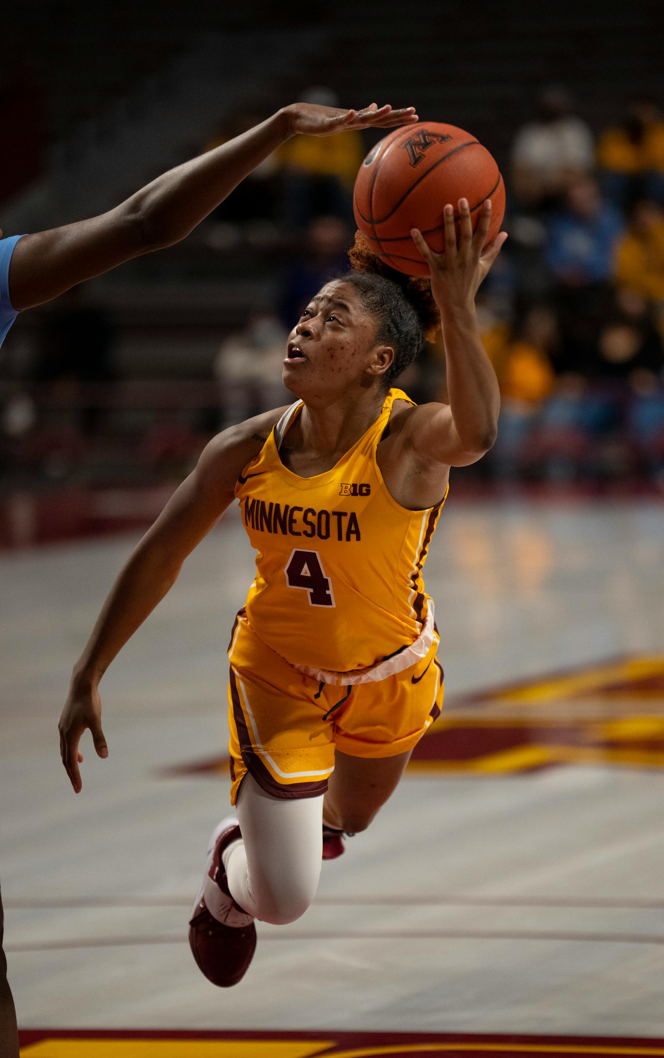 Minnesota Gophers guard Jasmine Powell (4) put up a fourth quarter shot before crashing to the floor Wednesday, Dec. 1, 2021 at Williams Arena in Minneapolis. The University of Minnesota women's basketball team lost to the University of North Carolina 82-76 in an NCAA basketball game Wednesday, Dec. 1, 2021 night at Williams Arena in Minneapolis. ] JEFF WHEELER • Jeff.Wheeler@startribune.com