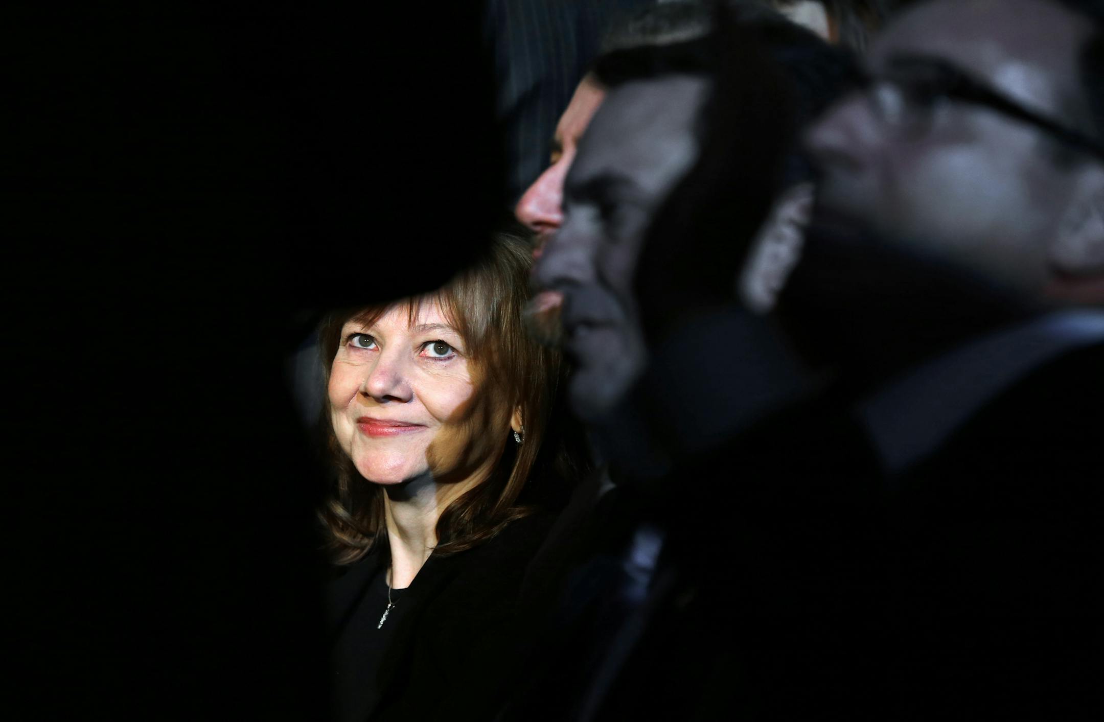 FILE - In this Monday, Jan. 13, 2014, file photo incoming General Motors CEO Mary Barra watches the North American Truck of the Year and Car of the Year awards at the North American International Auto Show in Detroit. General Motors reports quarterly earnings on Thursday, Feb. 6, 2014 (AP Photo/Paul Sancya)