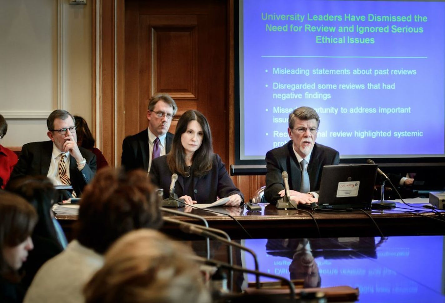 U of M Regent Dr. Patricia Simmons and President Eric Kaler, left, listened as Elizabeth Stawicki and State Auditor James Nobles delivered their report related to the death of Dan Markingson.