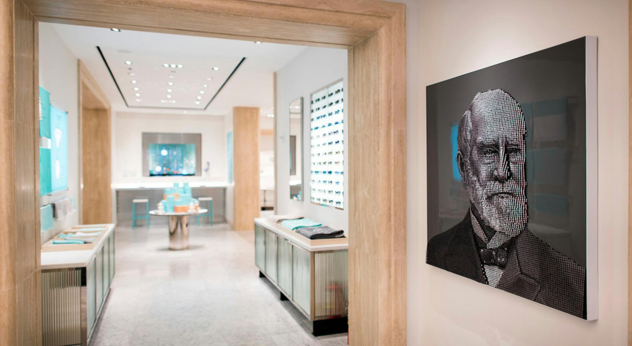 A portrait of Tiffany & Co. founder Charles Lewis Tiffany hangs in screw-head bas-relief on the home and accessories floor of Tiffany’s Fifth Avenue flagship store, in New York, Nov. 1, 2017. LVMH Moet Hennessy Louis Vuitton is already one of the world’s biggest luxury goods empires. Now it is interested in adding yet another high-end name to its coterie of brands: Tiffany, the famous seller of engagement rings and other jewelry. (Joshua Bright/The New York Times) A portrait of Tif