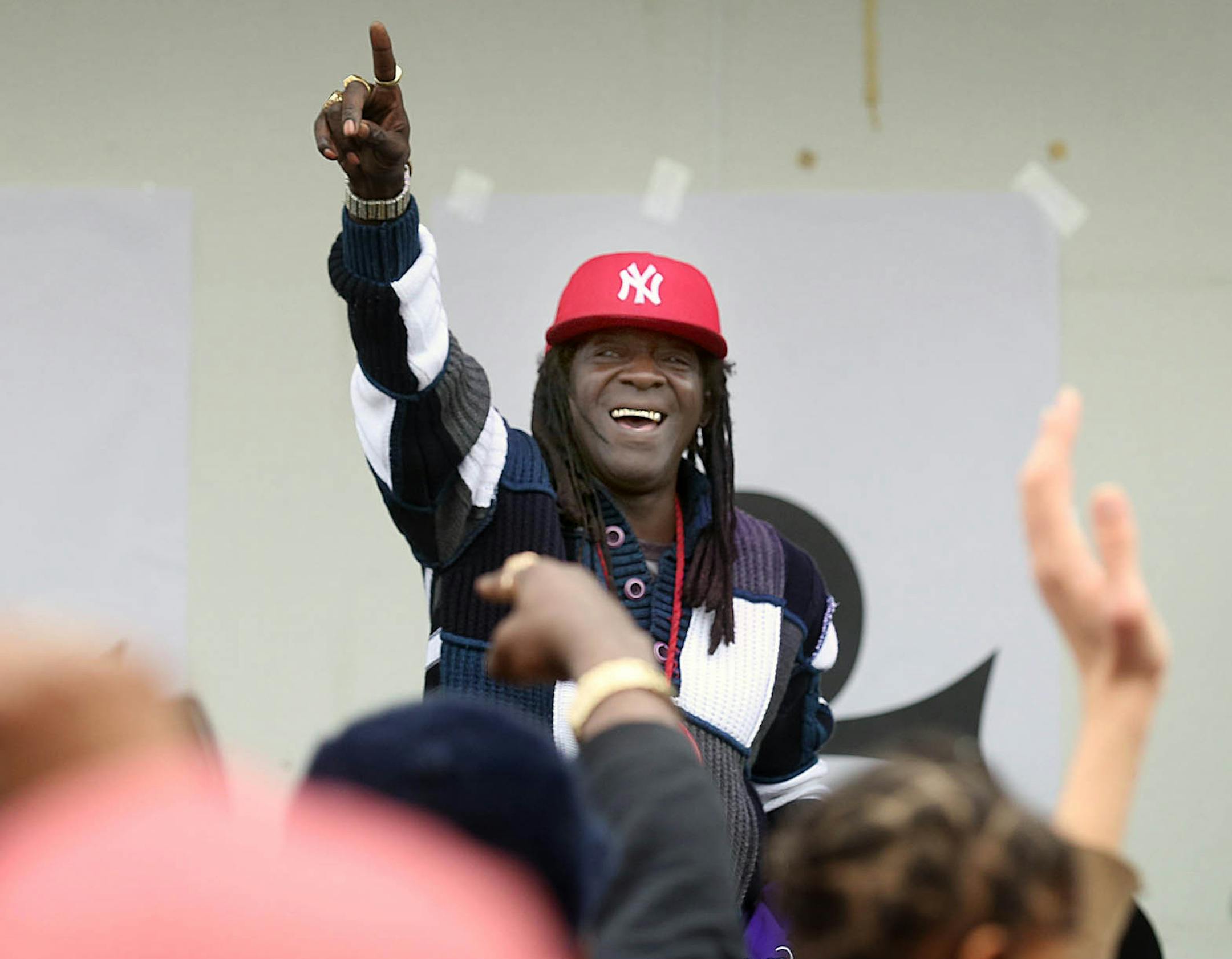 Flavor Flav celebrated the life of Prince with the crowd.] JIM GEHRZ ï james.gehrz@startribune.com / Minneapolis, MN / April 30, 2016 /1:00 PM ñ BACKGROUND INFORMATION: Saturday, April 30; 1-6 pm: Prince Block Party at Sabathani Community Center. The event will feature Prince-inspired musicians, Ray Seville as DJ and of course, music by Prince, plus magicians, bounce houses, puppeteers and more family fun! The event is family-friendly and free and open to the public. Attendees are enco