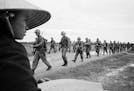 Marines marching in Danang in a scene from "The Vietnam War." Director Ken Burns said,"Vietnam was a tale of morality with an identity that's woven in